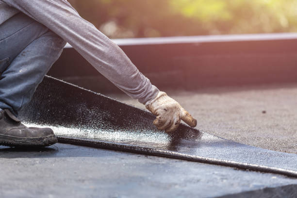 Professional Waterproofing technician working in Knowlesville, NY